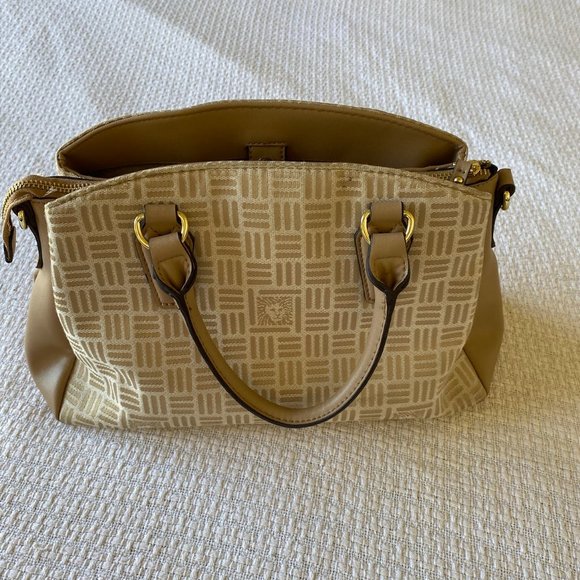 Anne Klein Engraved Lion Logo Gold-Tone Zippered Clutch - Picture 2 of 9